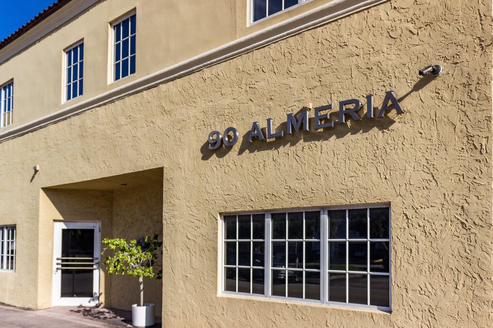 Detail of the 90 Almeria signage on the Union Title Services office building